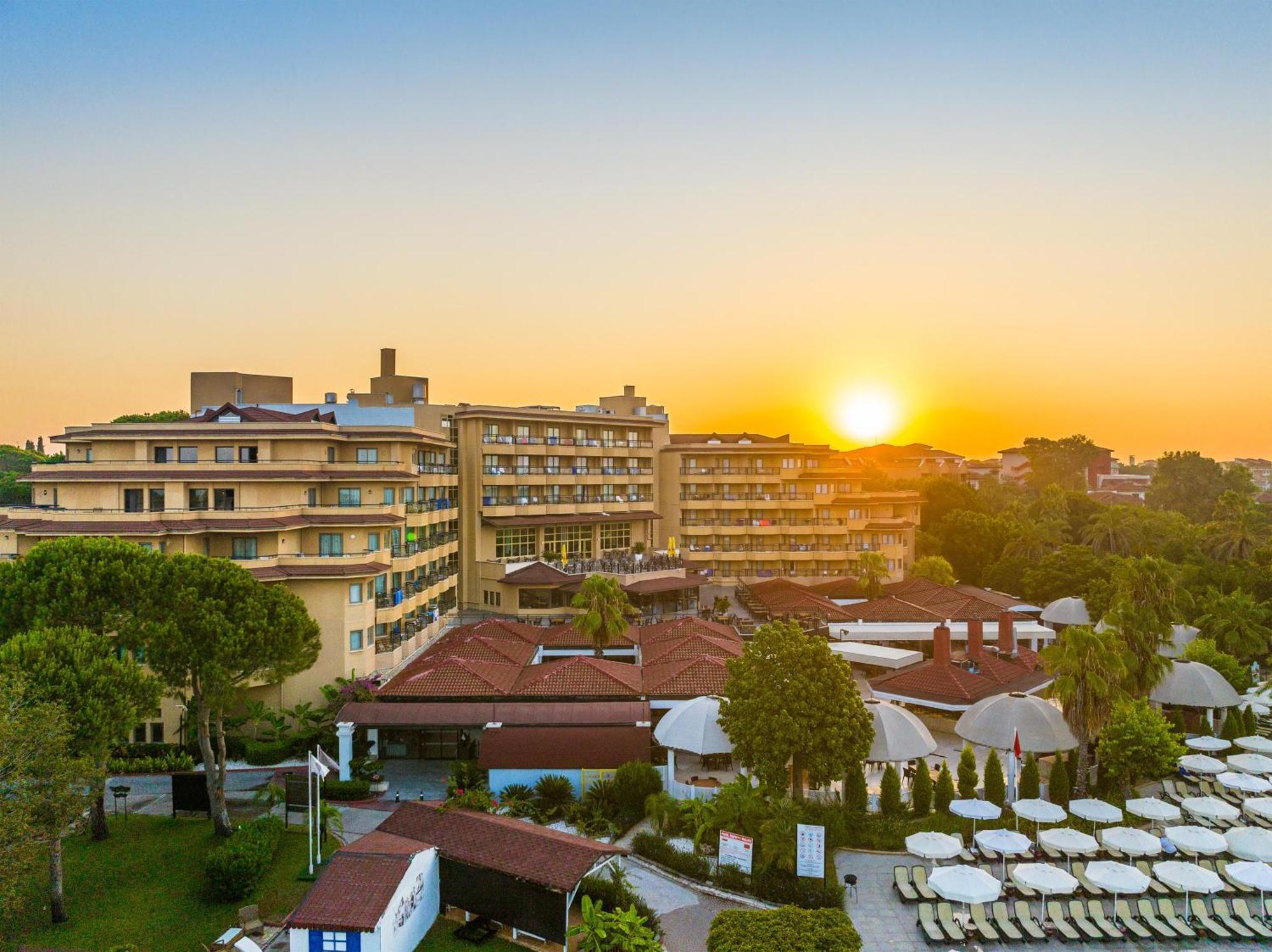 אנטליה Asteria Family Resort Belek מראה חיצוני תמונה Sunset at the hotel